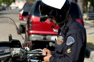 cop writing a ticket