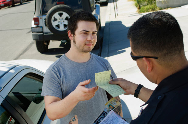 Man receiving traffic ticket